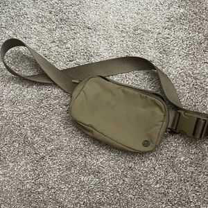 Olive green Lululemon belt bag
